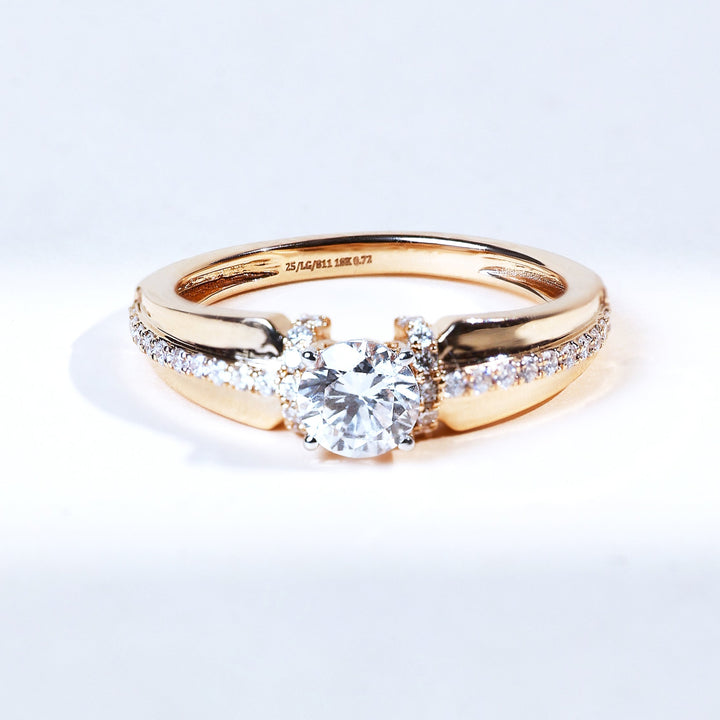 Signature T 0.5 ct round solitaire diamond ring in yellow gold with pavé accents