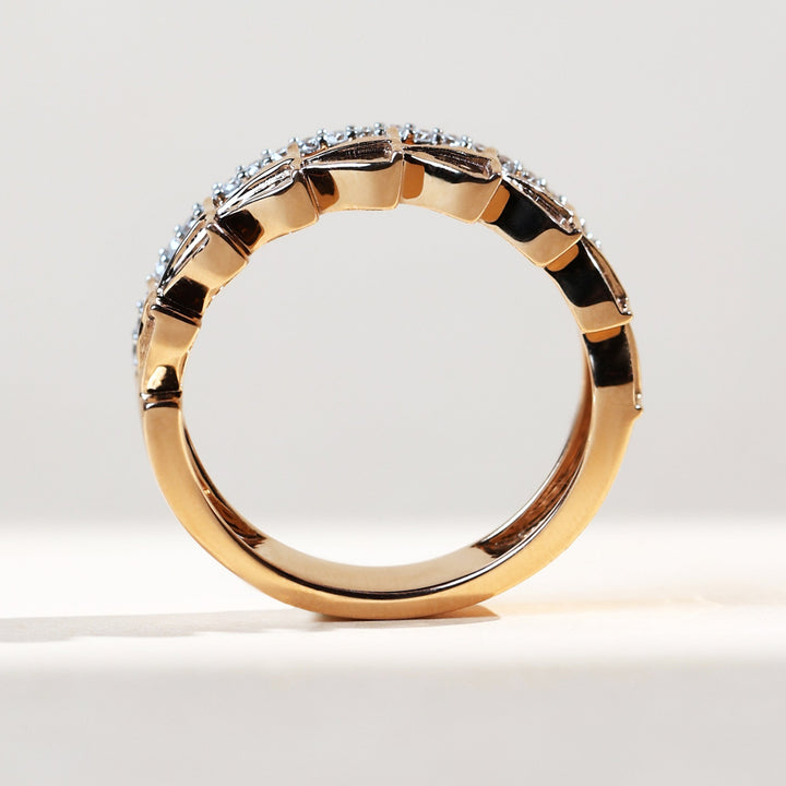 Side profile of Signature TD Gold Eternity Band featuring geometric gold pattern with diamonds