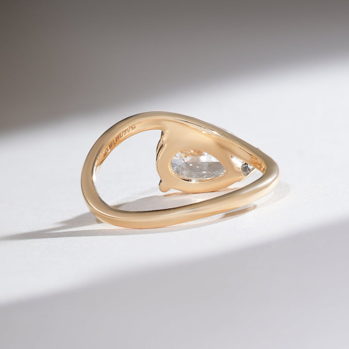 Back view of the Sirena 1.7 Ct pear solitaire ring highlighting the open gallery and pear-shaped diamond.