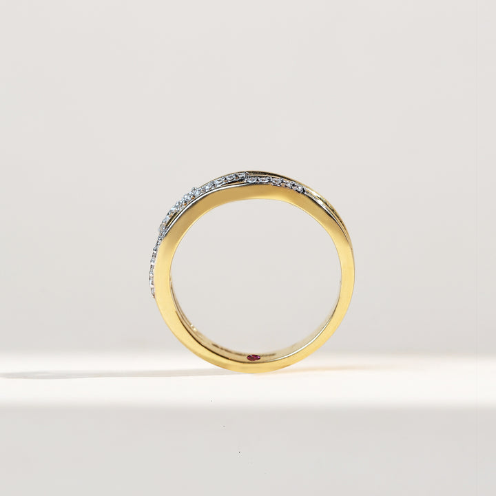 Side profile of Sparkle in Waves Dailywear Ring showing wave-like overlapping gold and diamond bands.