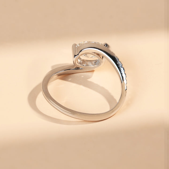 Back view showing curved shank of oval solitaire diamond ring in white gold