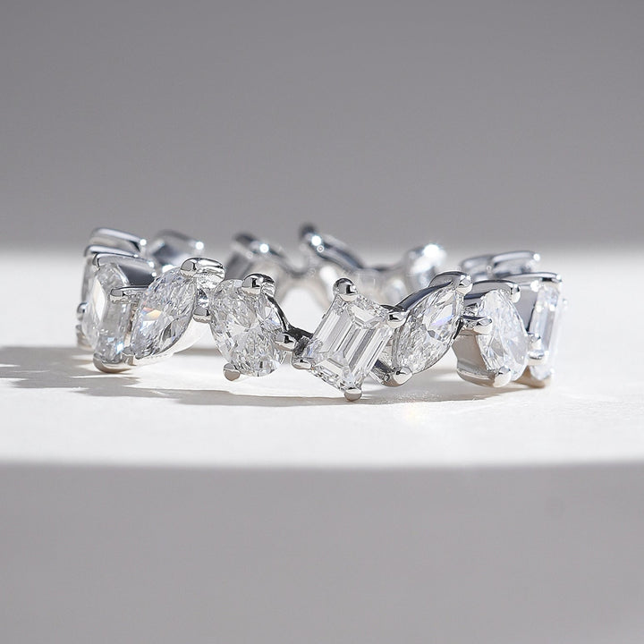 Front view of Trio Forever 2 Ct Eternity Band with alternating marquise, oval, and emerald-cut diamonds in white gold.