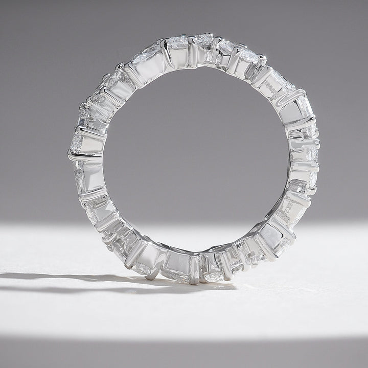 Side profile of the Trio Forever 2 Ct Eternity Band displaying the continuous diamond arrangement and detailed prong work.