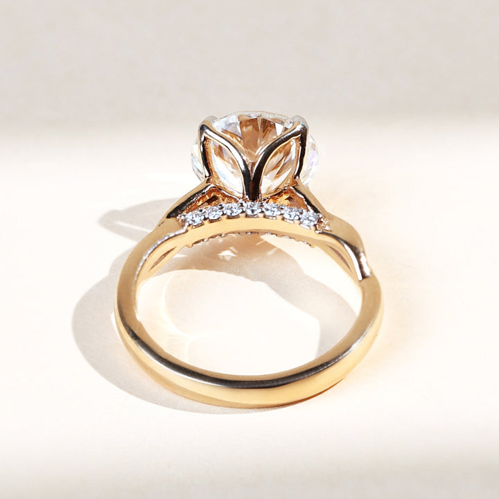 Back shot highlighting diamond detailing beneath the solitaire.