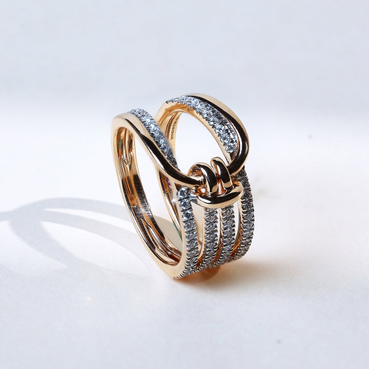 Angle view of Twisted Knot Promise Ring with pavé diamonds across multiple bands.
