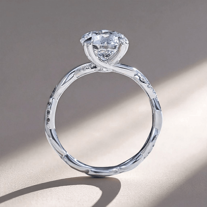 Profile view of the ring showing the twisted shank and high solitaire placement