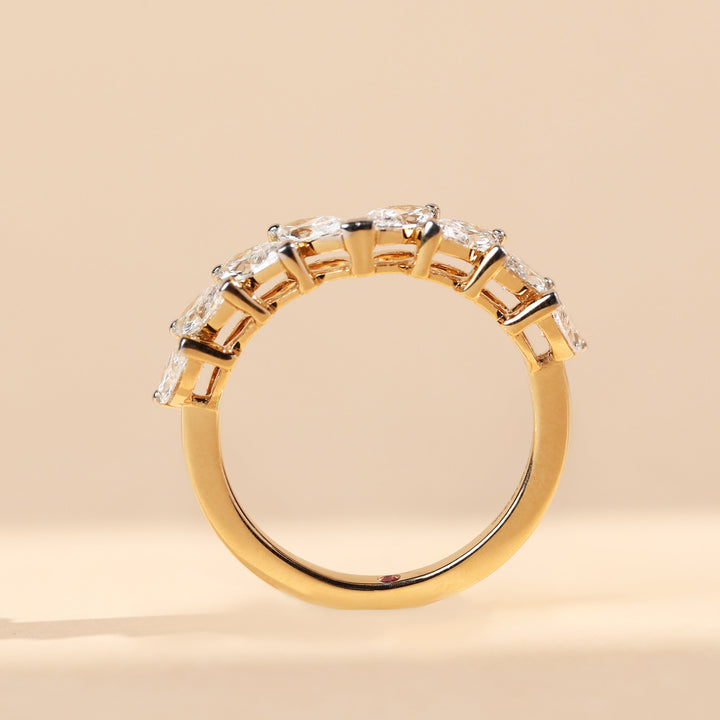 Side profile of Two Ways Promise Ring in yellow gold with marquise diamond band.