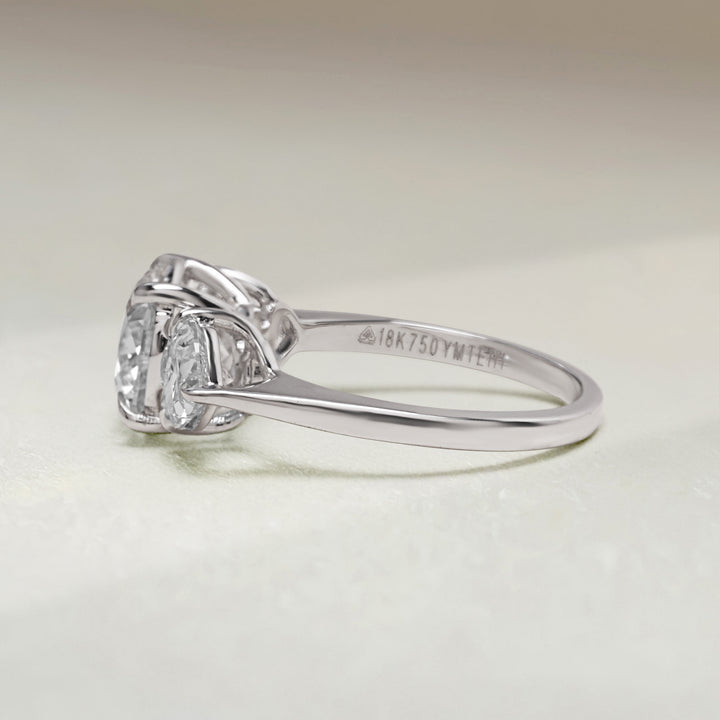 Side profile of Evermore 3.5 Ct Three Stone Ring showcasing sleek white gold band and diamond detailing.
