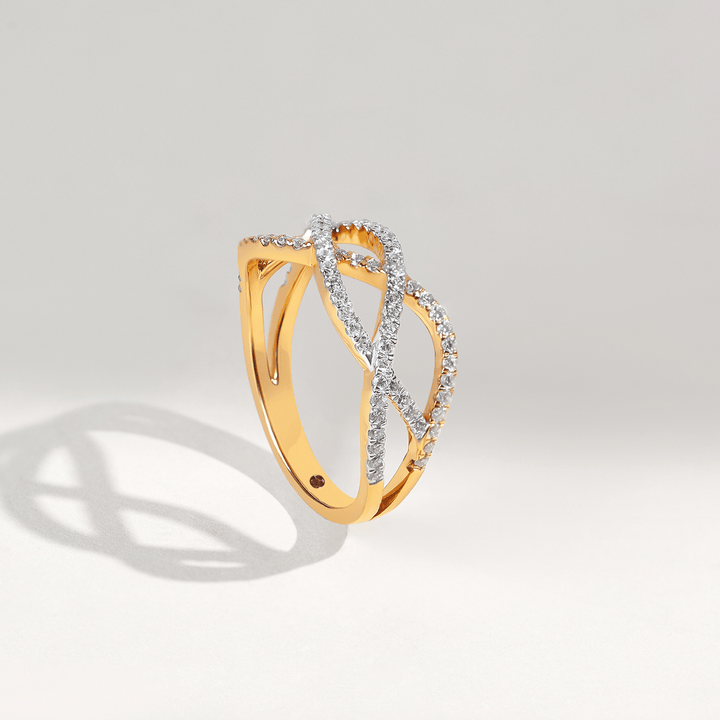 Side view showing overlapping diamond-studded loops of Weaved In Dailywear Ring.