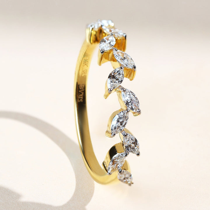 Side angle of the Willow Spark ring showing alternating marquise-cut diamonds.