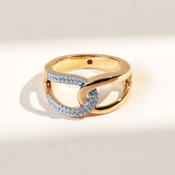 Front view of Zodiac Loop Promise Ring in gold with diamond-studded loop centerpiece.