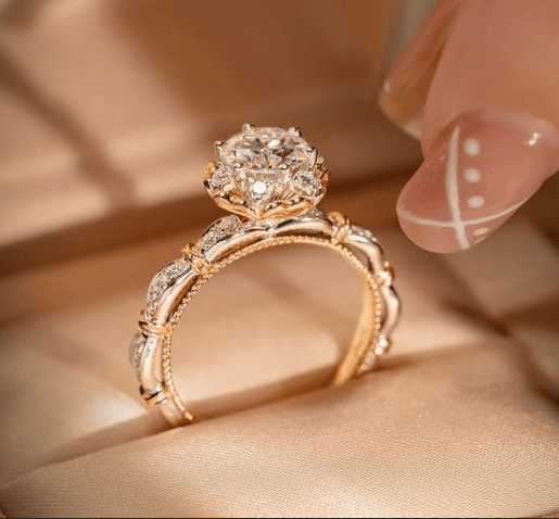 Close-up front angle of the 1 Ct Sweetheart Shine solitaire ring in a rose-gold scalloped band.